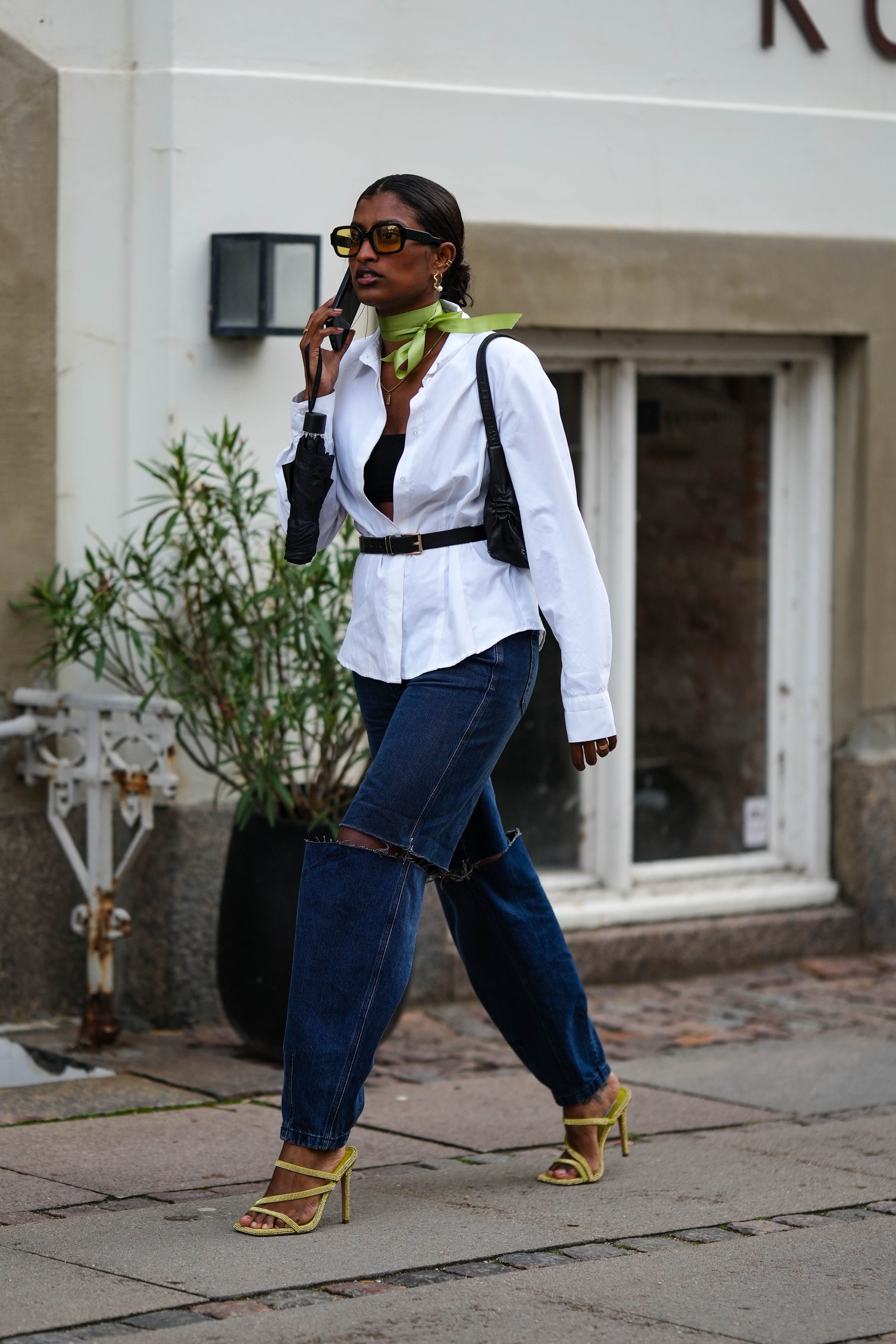 guest-wears-black-sunglasses-a-green-silk-scarf-a-white-news-photo-1693423126