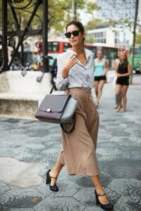02-a-striped-button-down-camel-high-waisted-culottes-black-shoes-and-a-large-comfy-bag